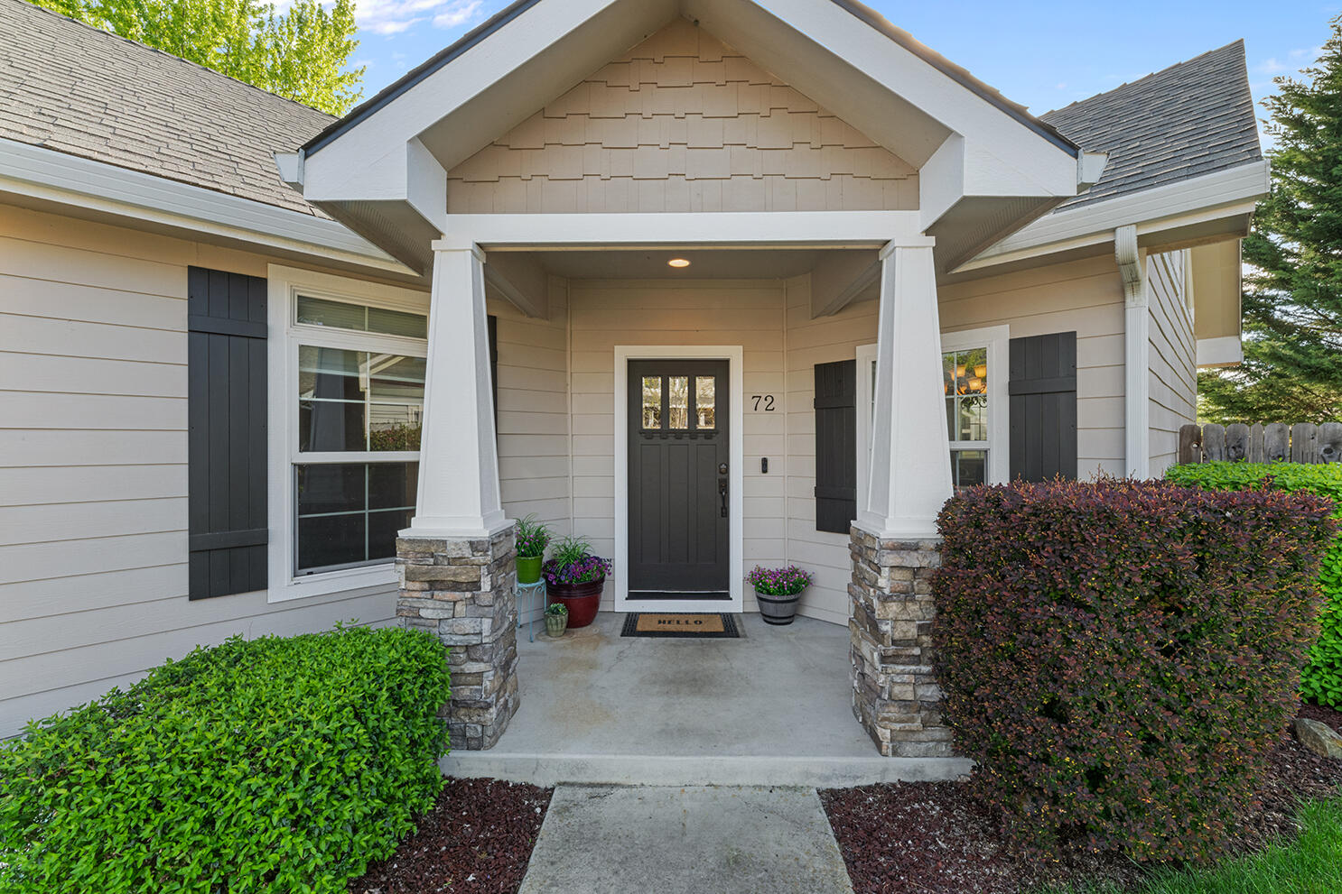 72 Pineridge Lane Eagle Point, OR 97524 - Photo 2 of 34 a view of a entryway door of the house with outdoor seating