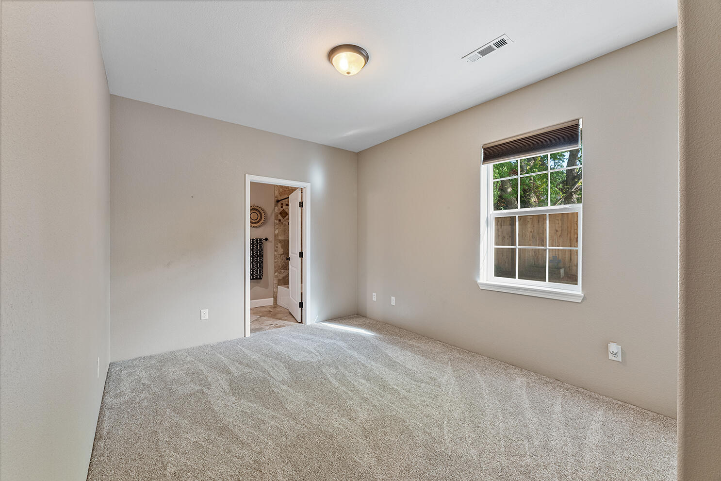 72 Pineridge Lane Eagle Point, OR 97524 - Photo 25 of 34 a view of an empty room with a window
