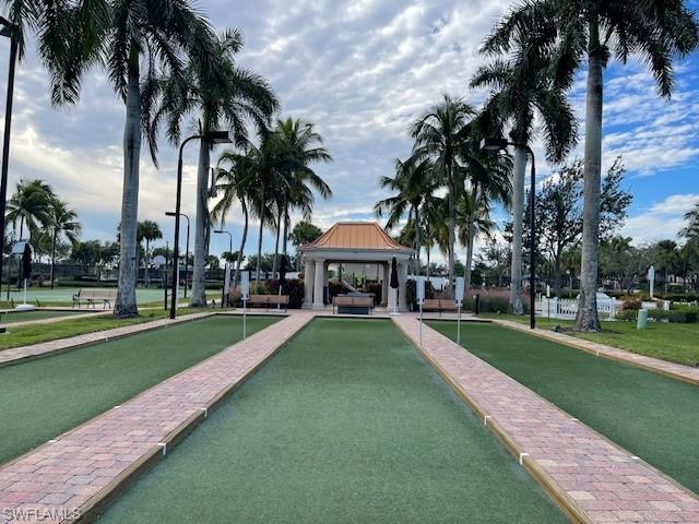 7304 Carducci Court Naples, FL 34114 - Photo 29 of 40 a view of a park with palm trees
