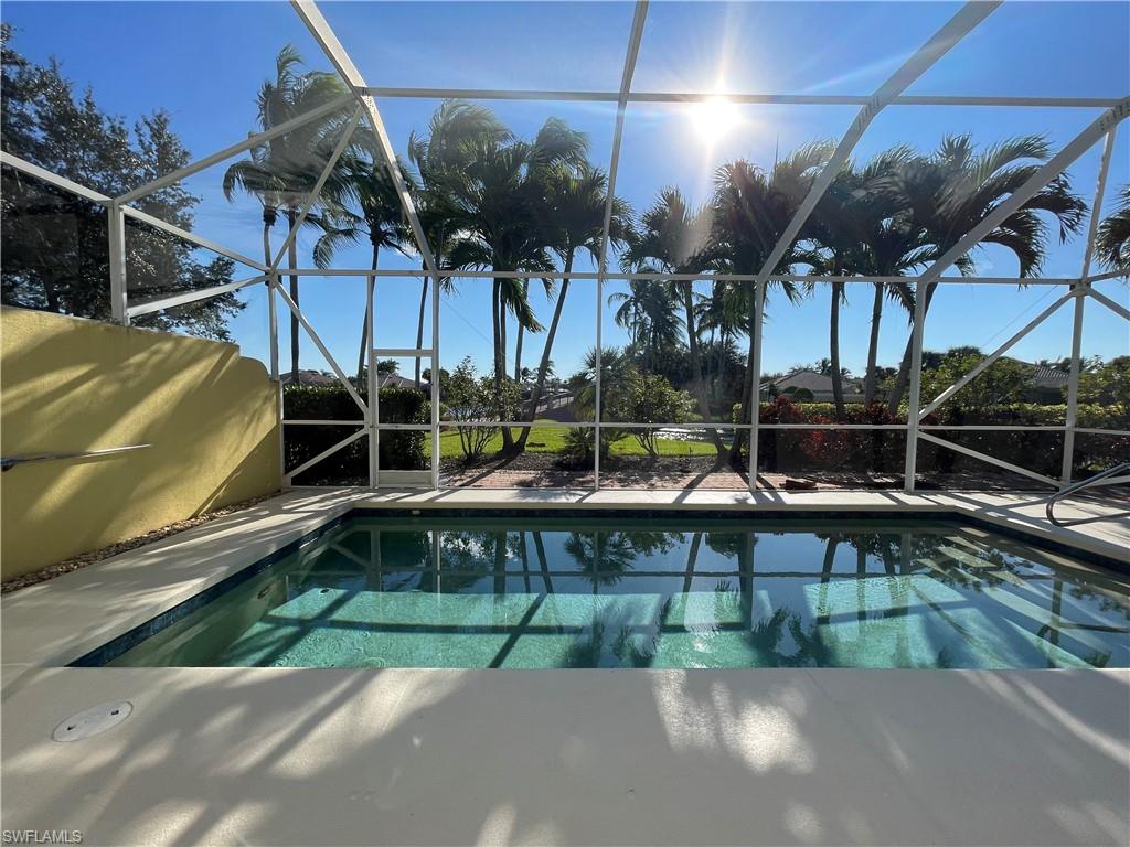 7304 Carducci Court Naples, FL 34114 - Photo 4 of 40 a house view with a outdoor seating