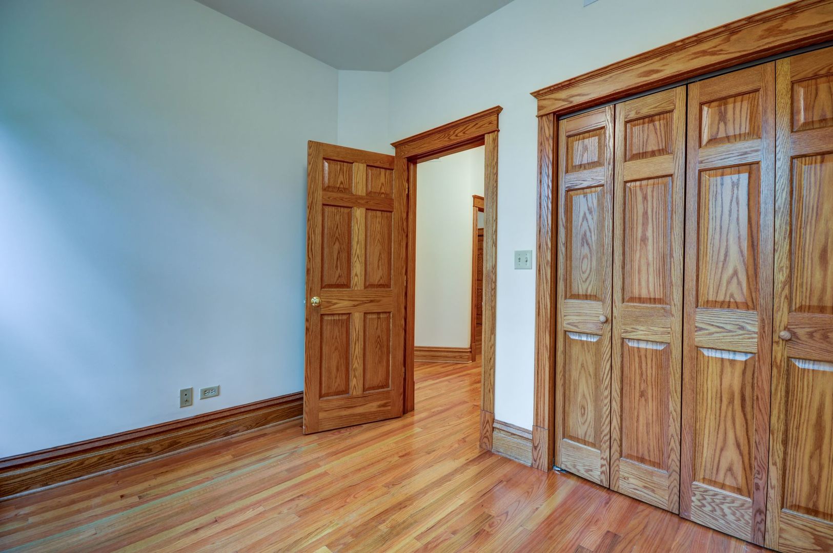 3722 North Fremont Street, Unit 2 Chicago, IL 60613 - Photo 13 of 16 a view of front door with wooden floor