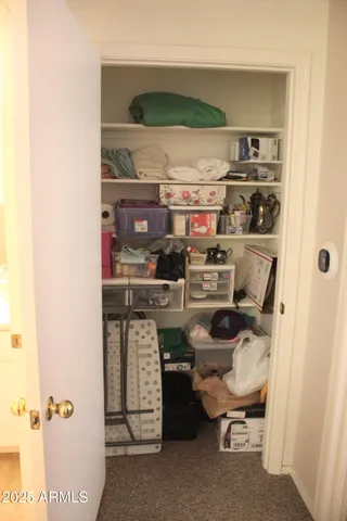 a kitchen with a stove and a refrigerator