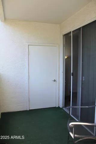 an empty room with a door