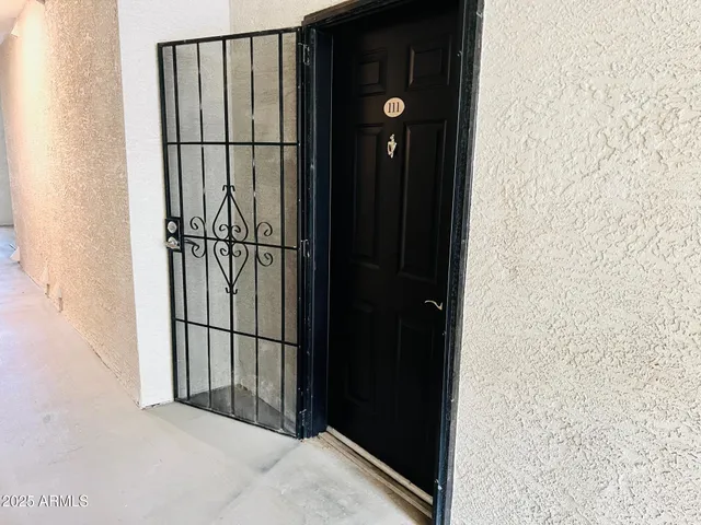 a house view with a sitting space and garden