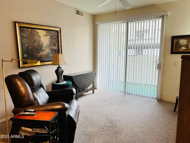 a room with furniture and a flat screen tv