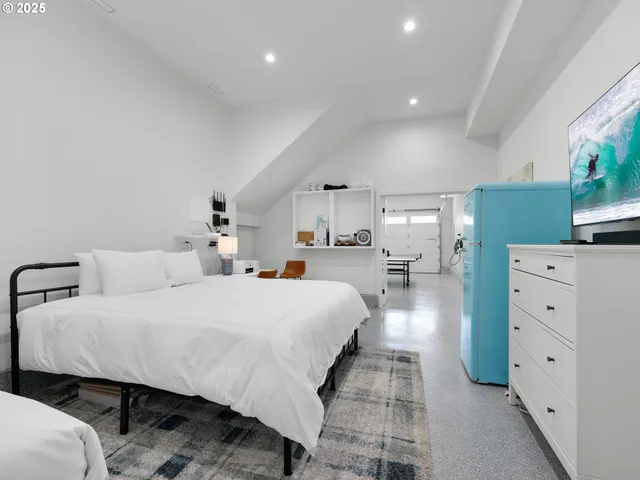 a bed room with a bed and with furniture