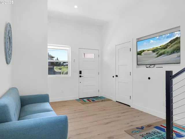 a view of livingroom with furniture and window