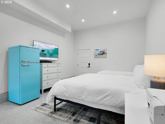 a bedroom with a bed and furniture