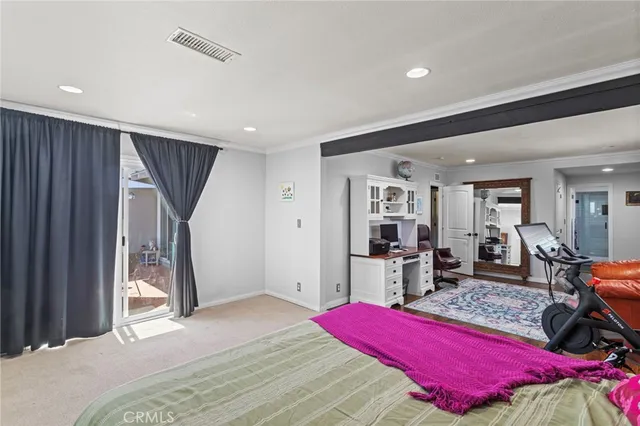 a bed room with a bed and furniture