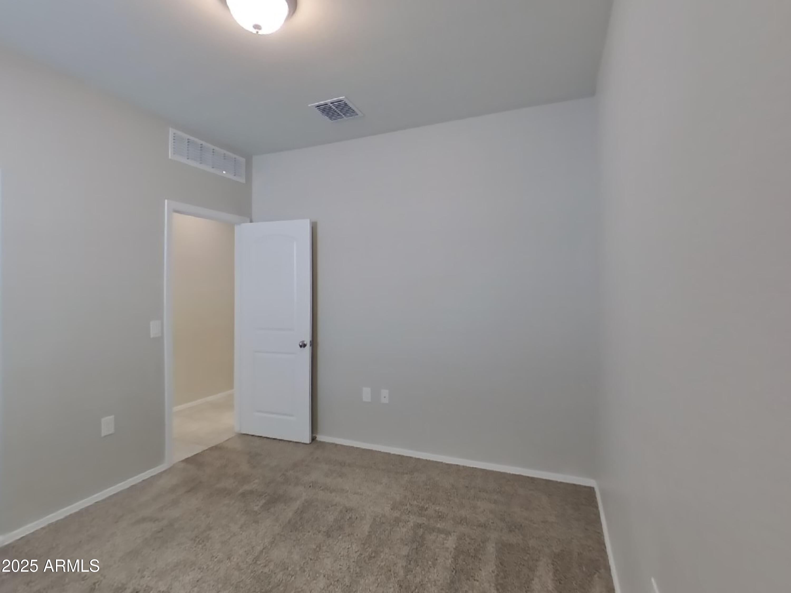 5288 Iridium Way San Tan Valley, AZ 85143 - Photo 10 of 16 a view of an empty room