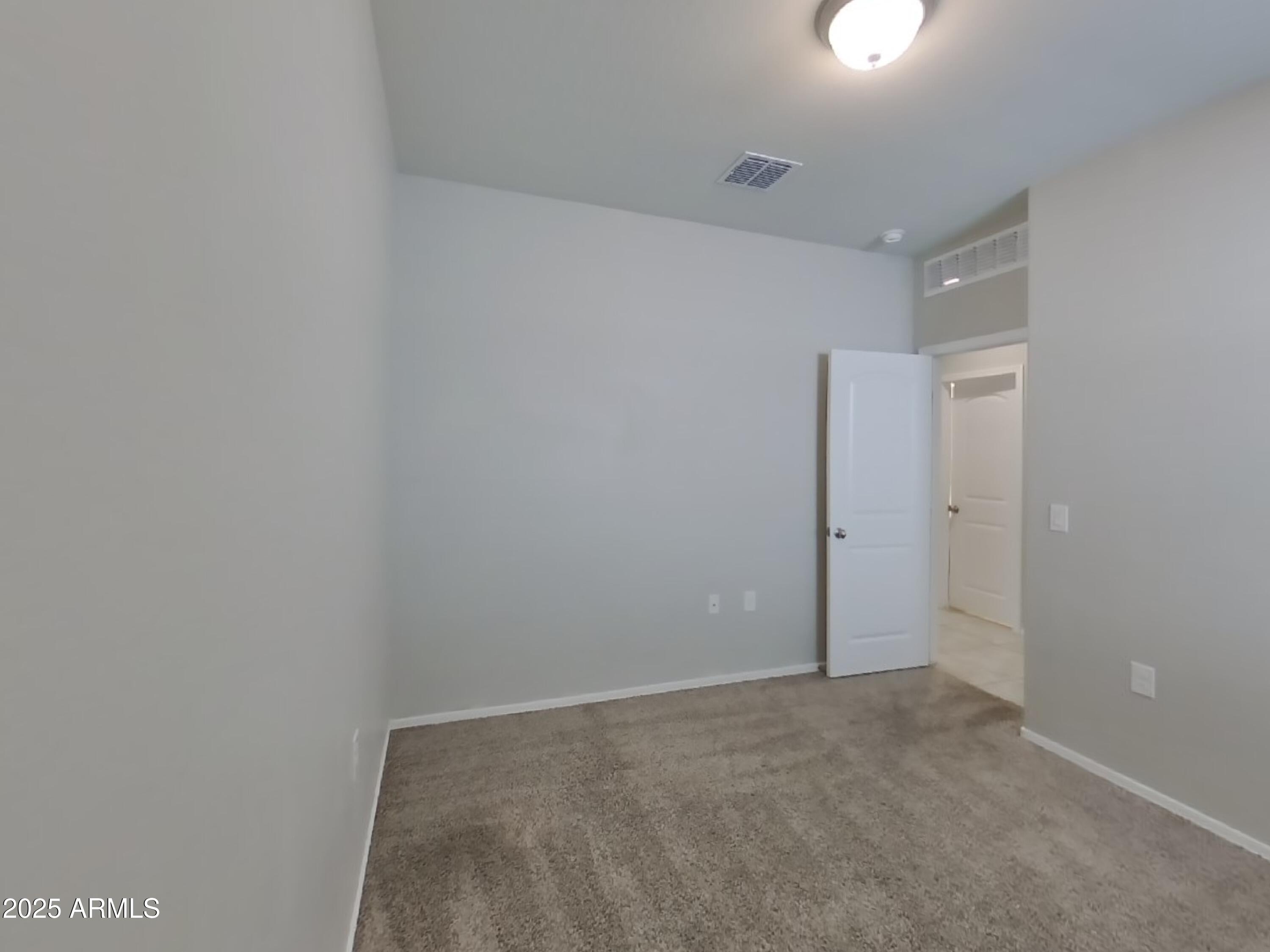 5288 Iridium Way San Tan Valley, AZ 85143 - Photo 12 of 16 a view of an empty room