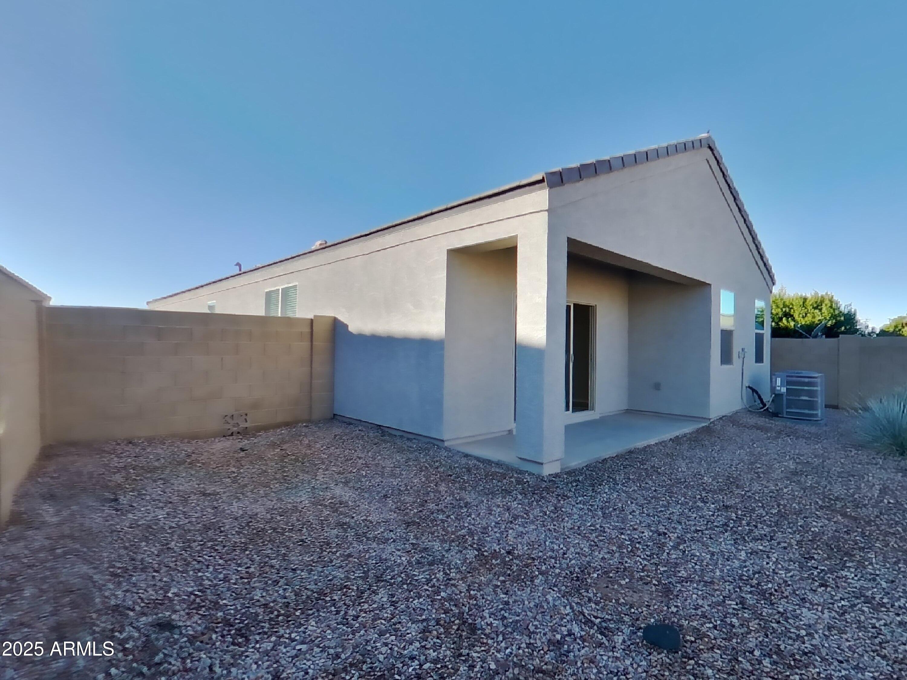 5288 Iridium Way San Tan Valley, AZ 85143 - Photo 15 of 16 a view of a house with a dry yard