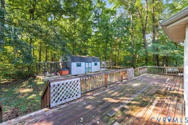 a view of a city with lush green forest