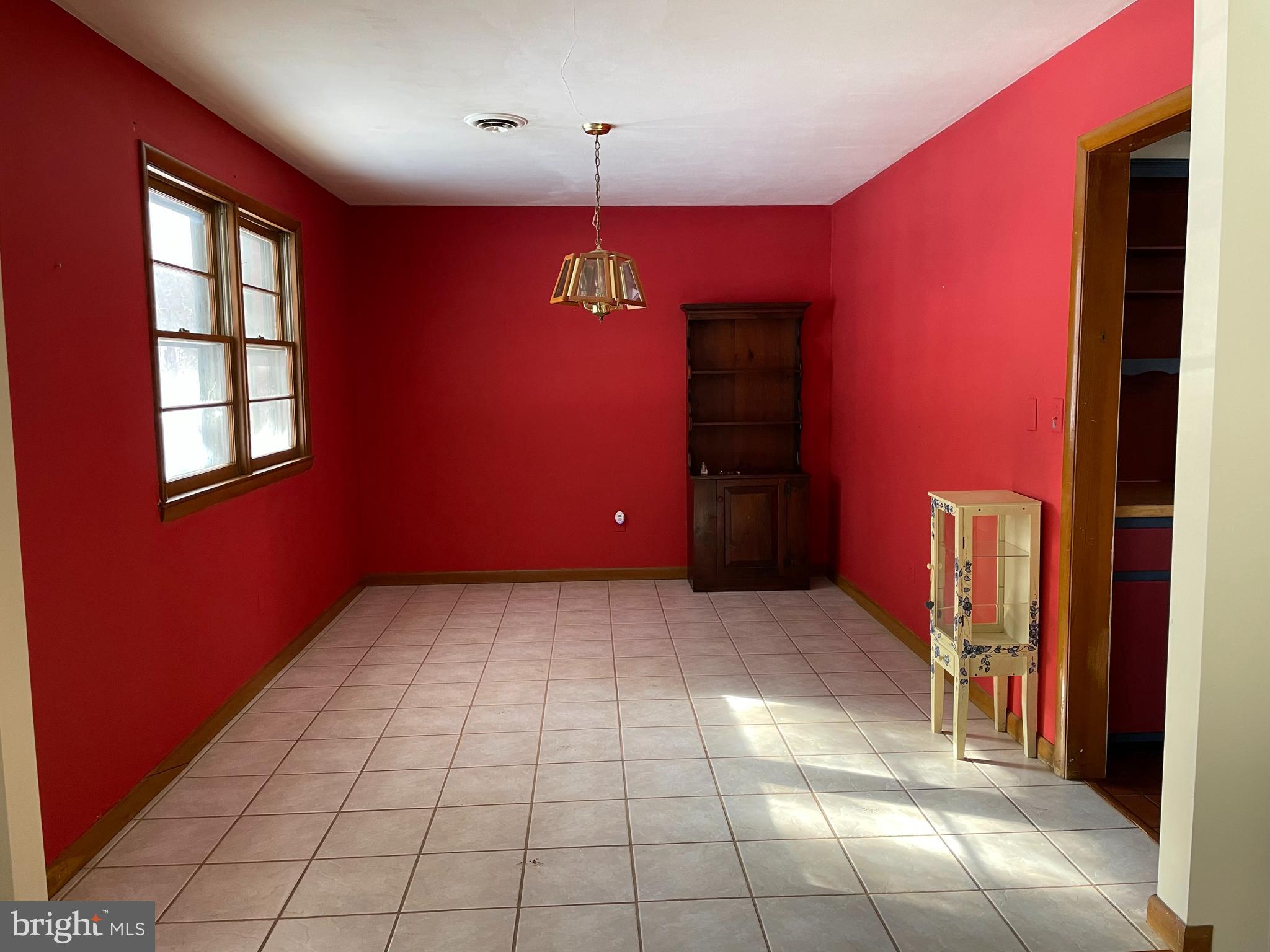 60 Ridge Road Gettysburg, PA 17325 - Photo 18 of 41 a view of an empty room with window and chandelier