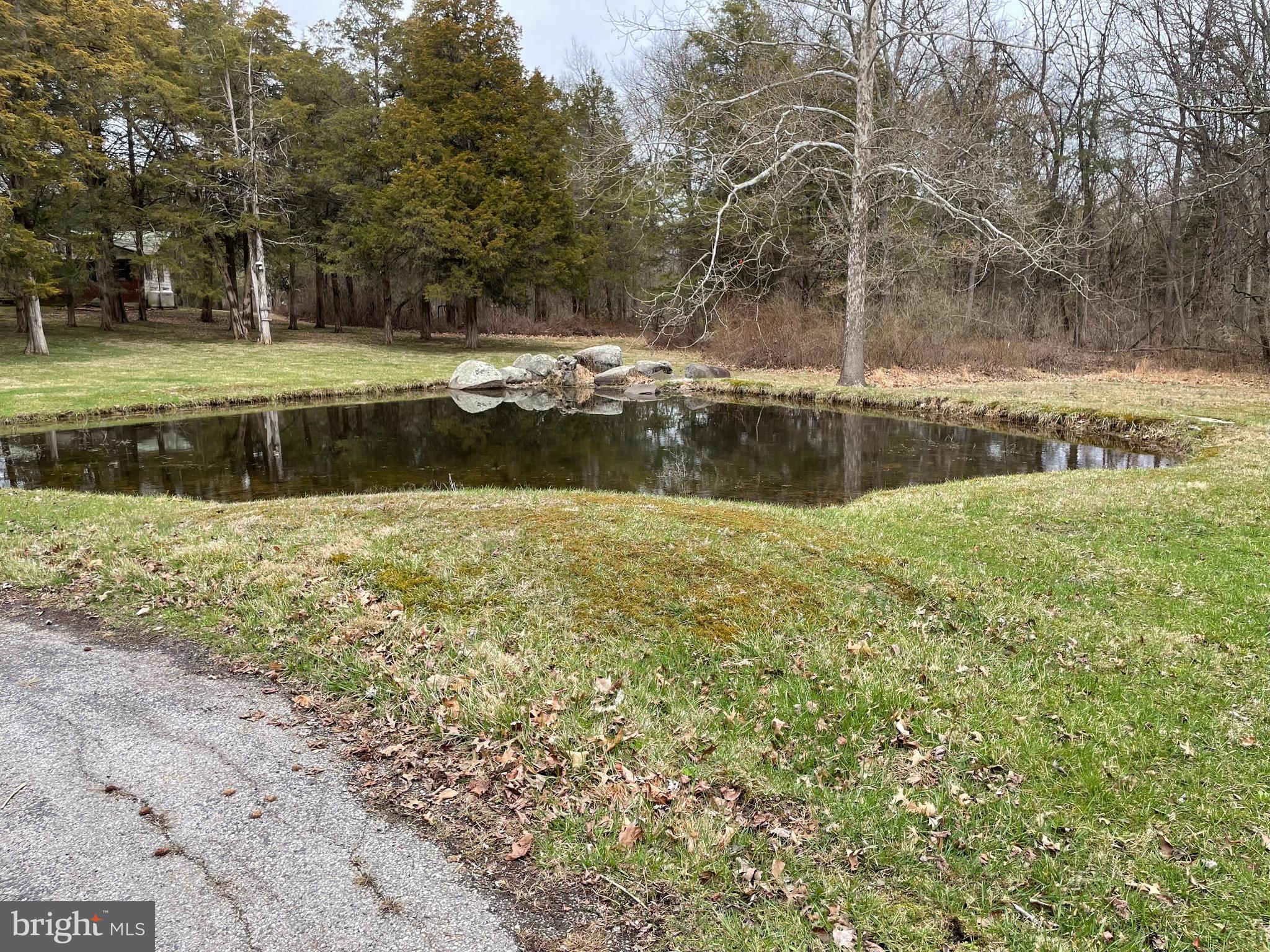 60 Ridge Road Gettysburg, PA 17325 - Photo 3 of 41 a view of a lake with a yard