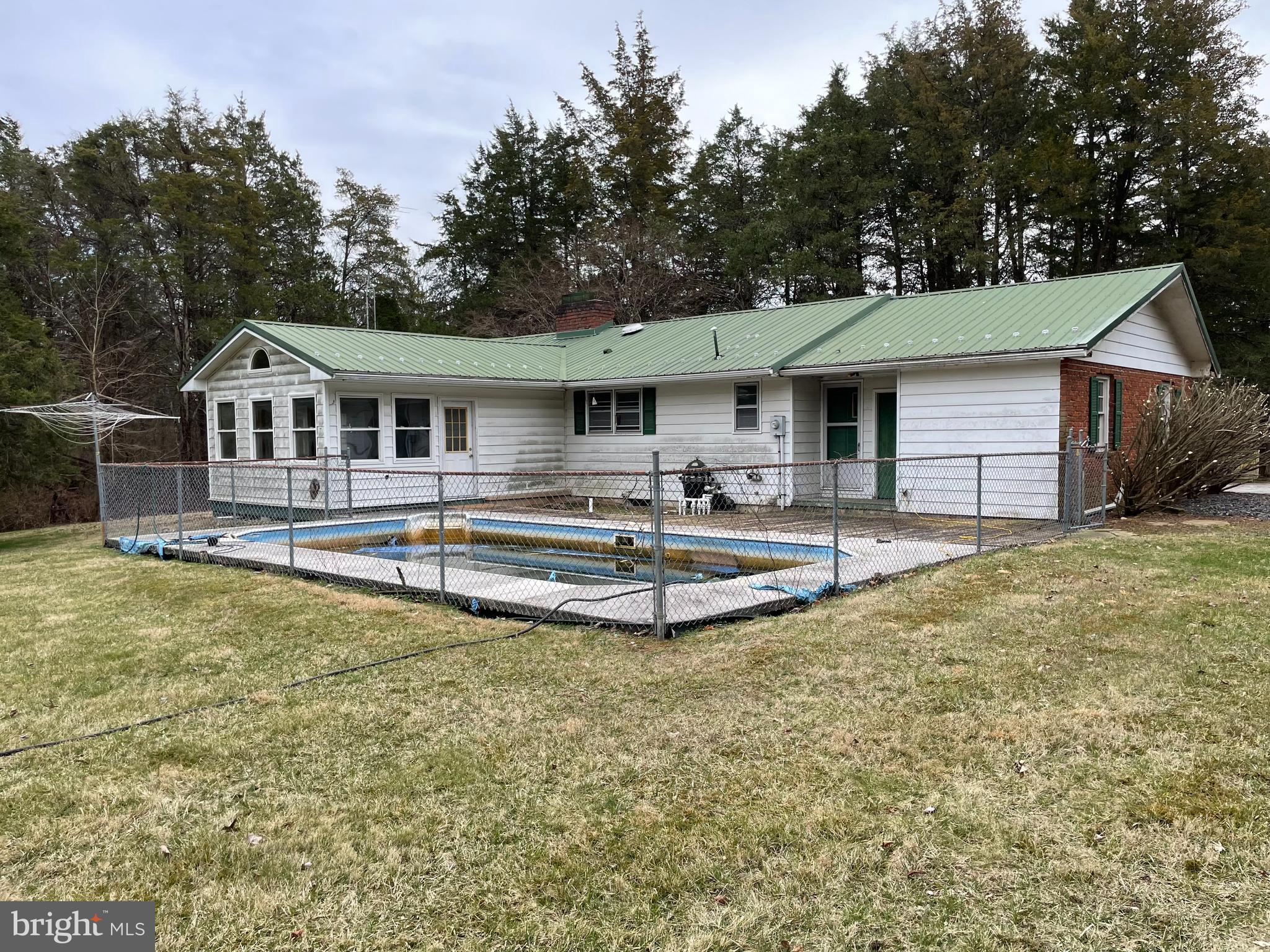 60 Ridge Road Gettysburg, PA 17325 - Photo 36 of 41 a front view of house with yard and trees in the background