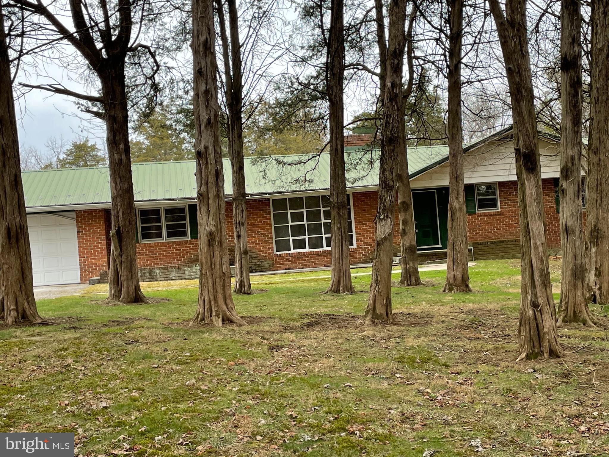 60 Ridge Road Gettysburg, PA 17325 - Photo 39 of 41 a tree in front of a house with a yard