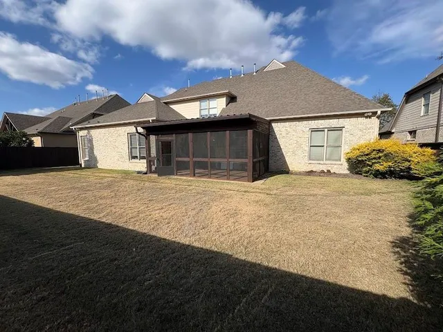 a house with yard in front of it