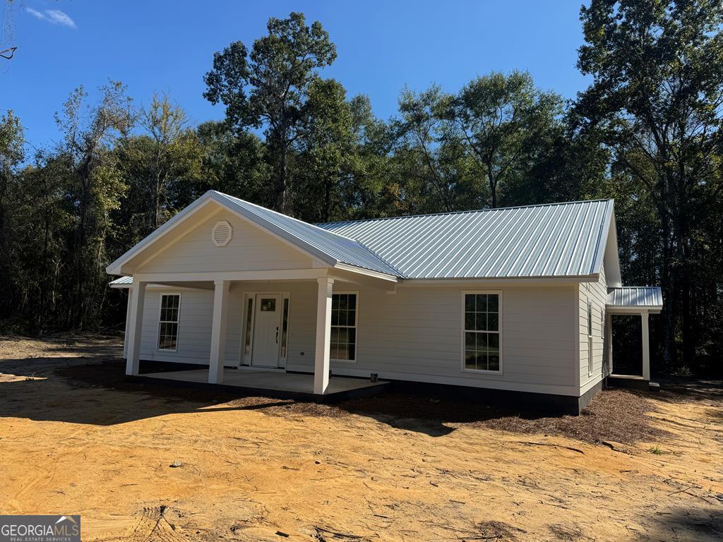 101 Bass Road Vienna, GA 31092 - Photo 1 of 1 a front view of a house with a yard