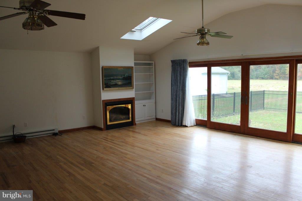 3139 Chancellor Point Road Trappe, MD 21673 - Photo 10 of 16 Family room with gas fireplace