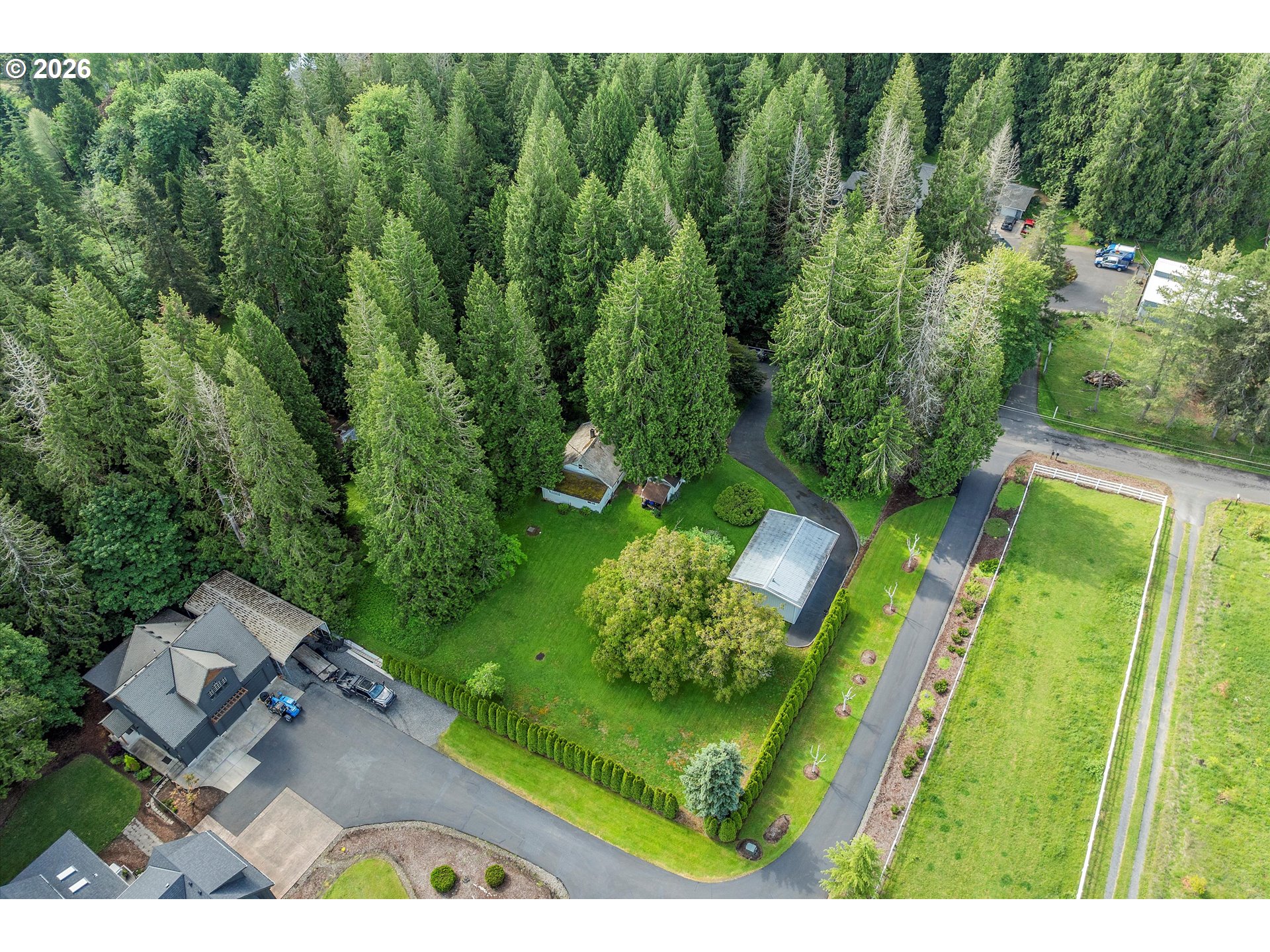 30185 Southeast Wheeler Road Boring, OR 97009 - Photo 14 of 27 a view of a garden with a fountain