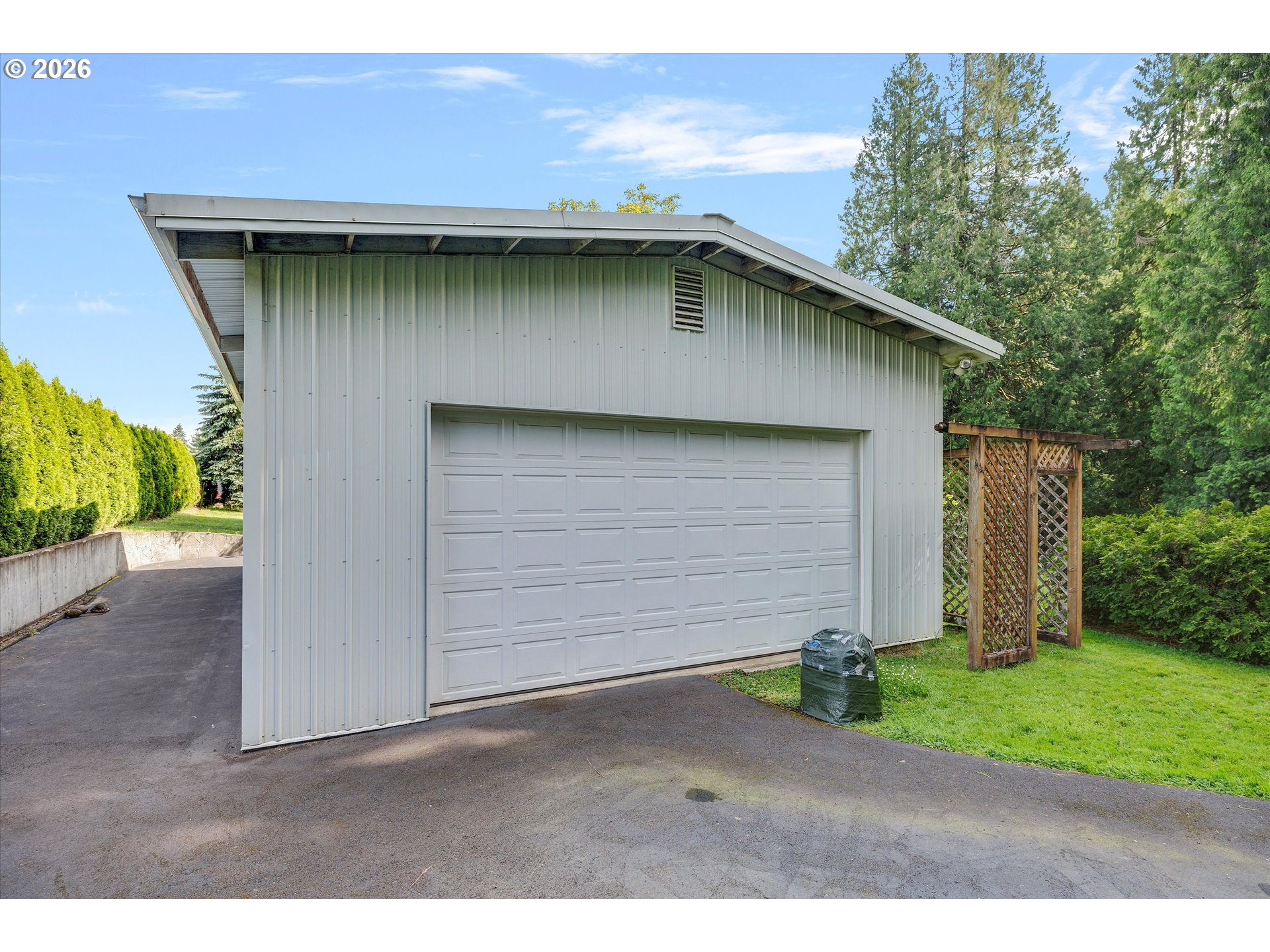 30185 Southeast Wheeler Road Boring, OR 97009 - Photo 17 of 27 a small white house with a outdoor space