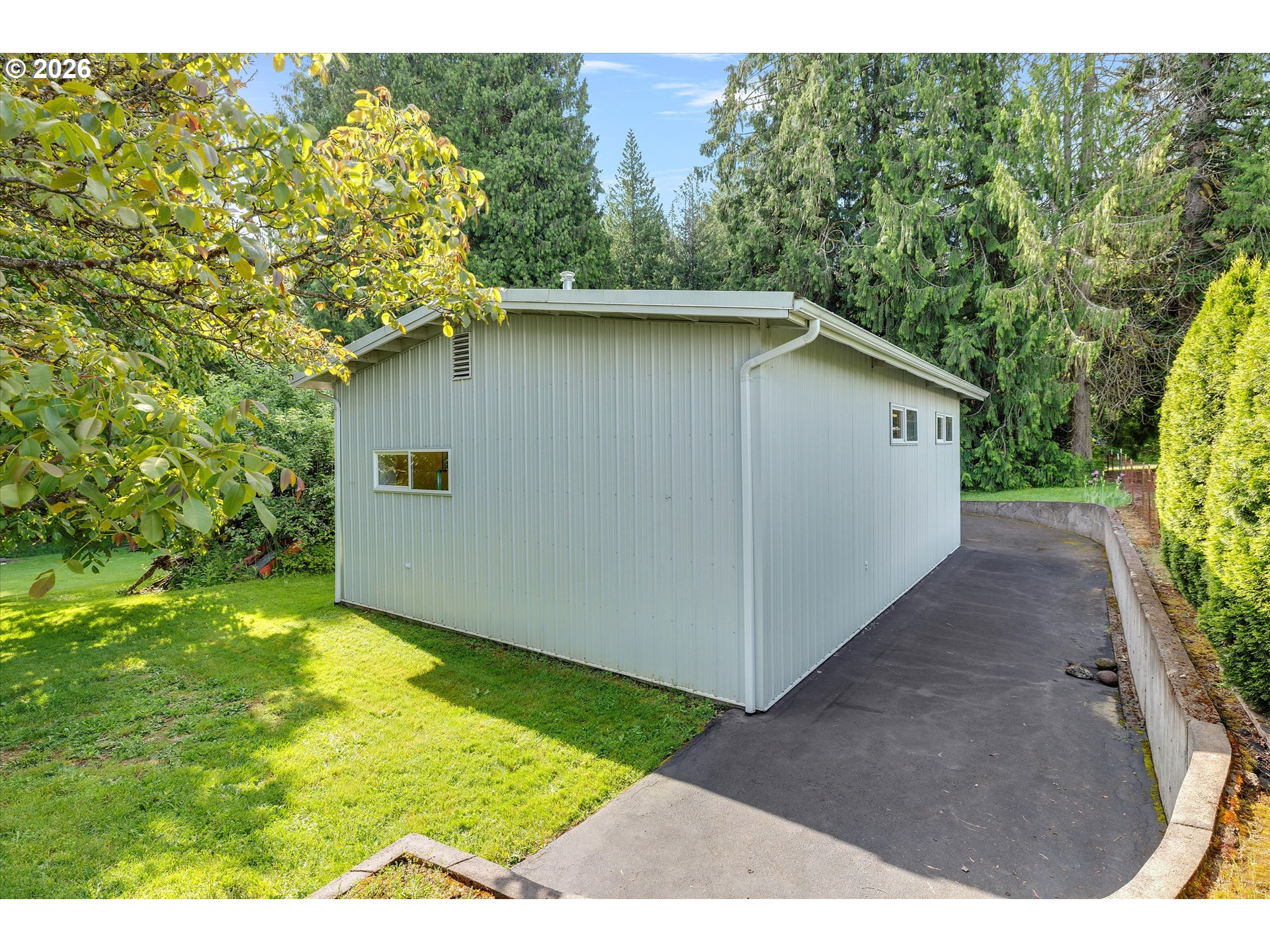 30185 Southeast Wheeler Road Boring, OR 97009 - Photo 21 of 27 a backyard of a house with lots of green space