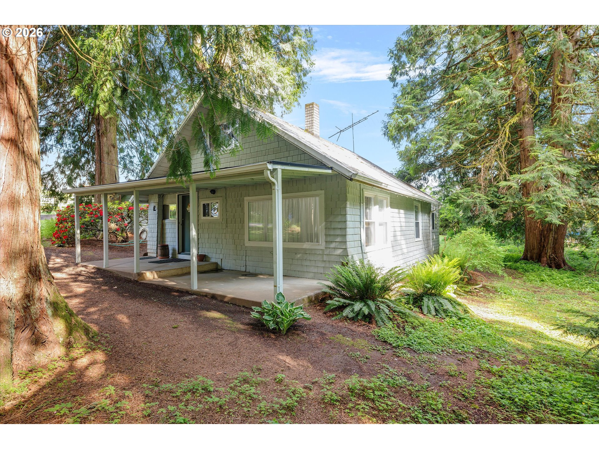 30185 Southeast Wheeler Road Boring, OR 97009 - Photo 27 of 27 a view of a house with a small yard plants and large tree