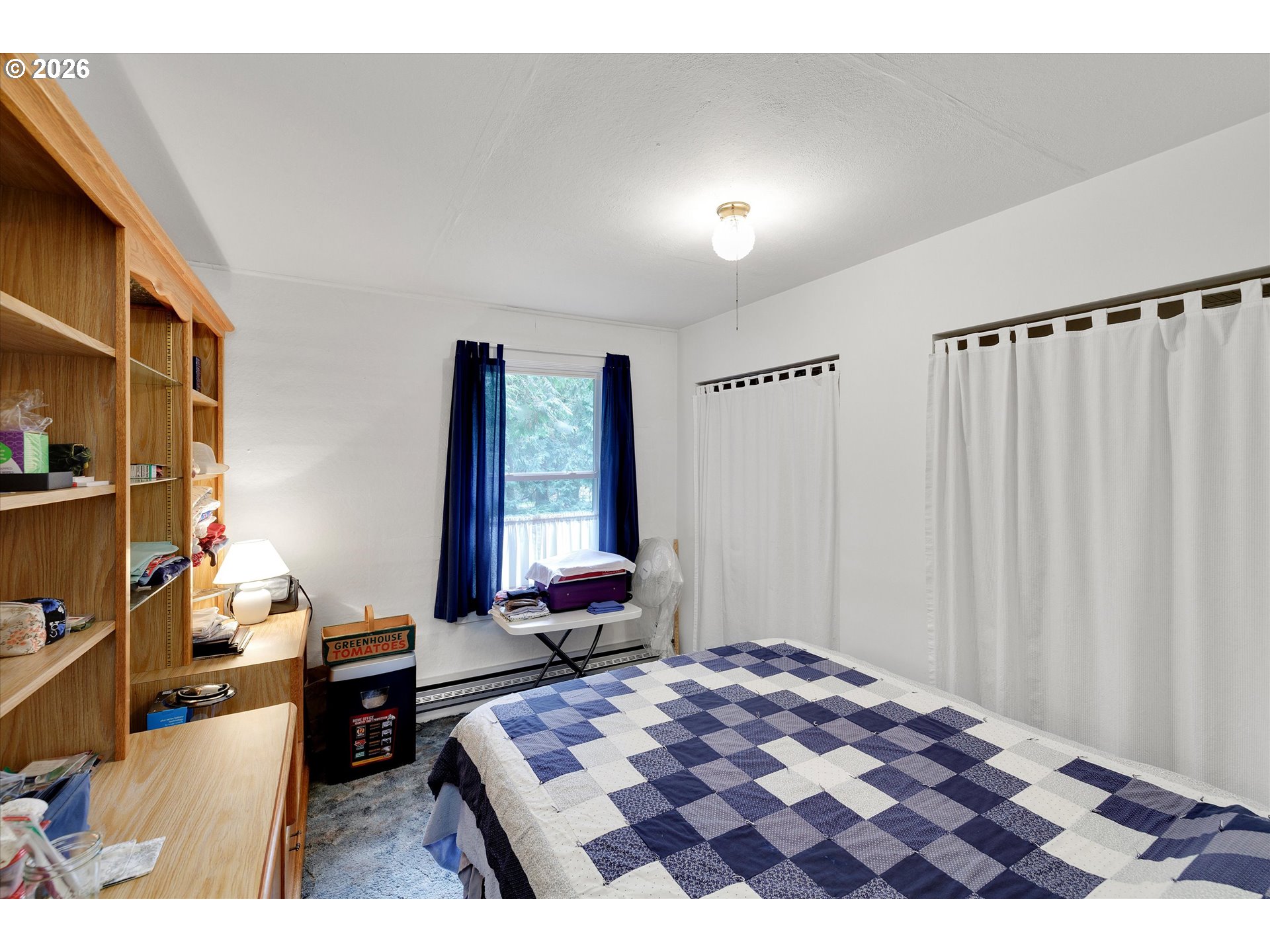 30185 Southeast Wheeler Road Boring, OR 97009 - Photo 8 of 27 a bedroom with a bed and a window