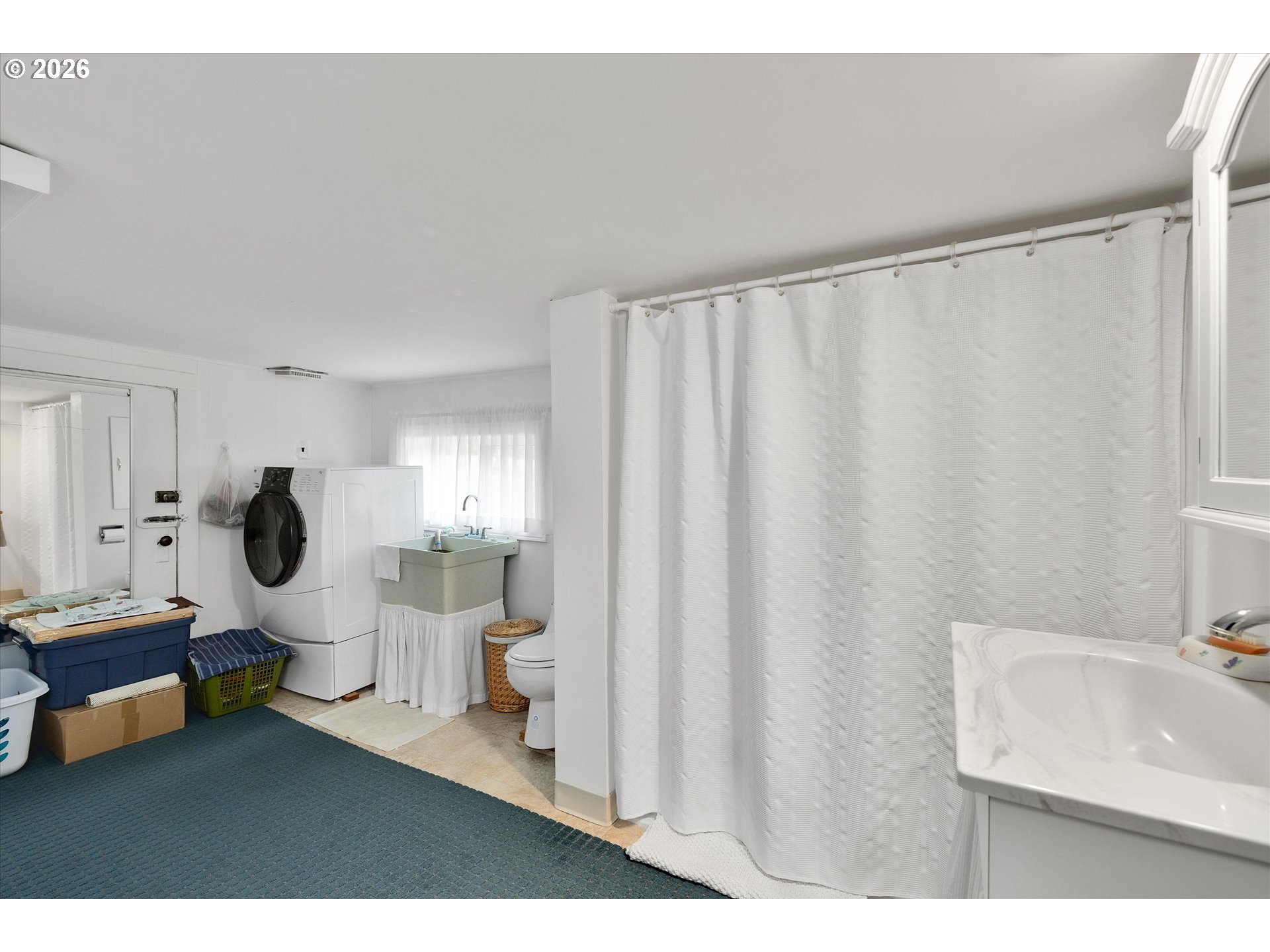 30185 Southeast Wheeler Road Boring, OR 97009 - Photo 9 of 27 a bathroom with a sink toilet and shower