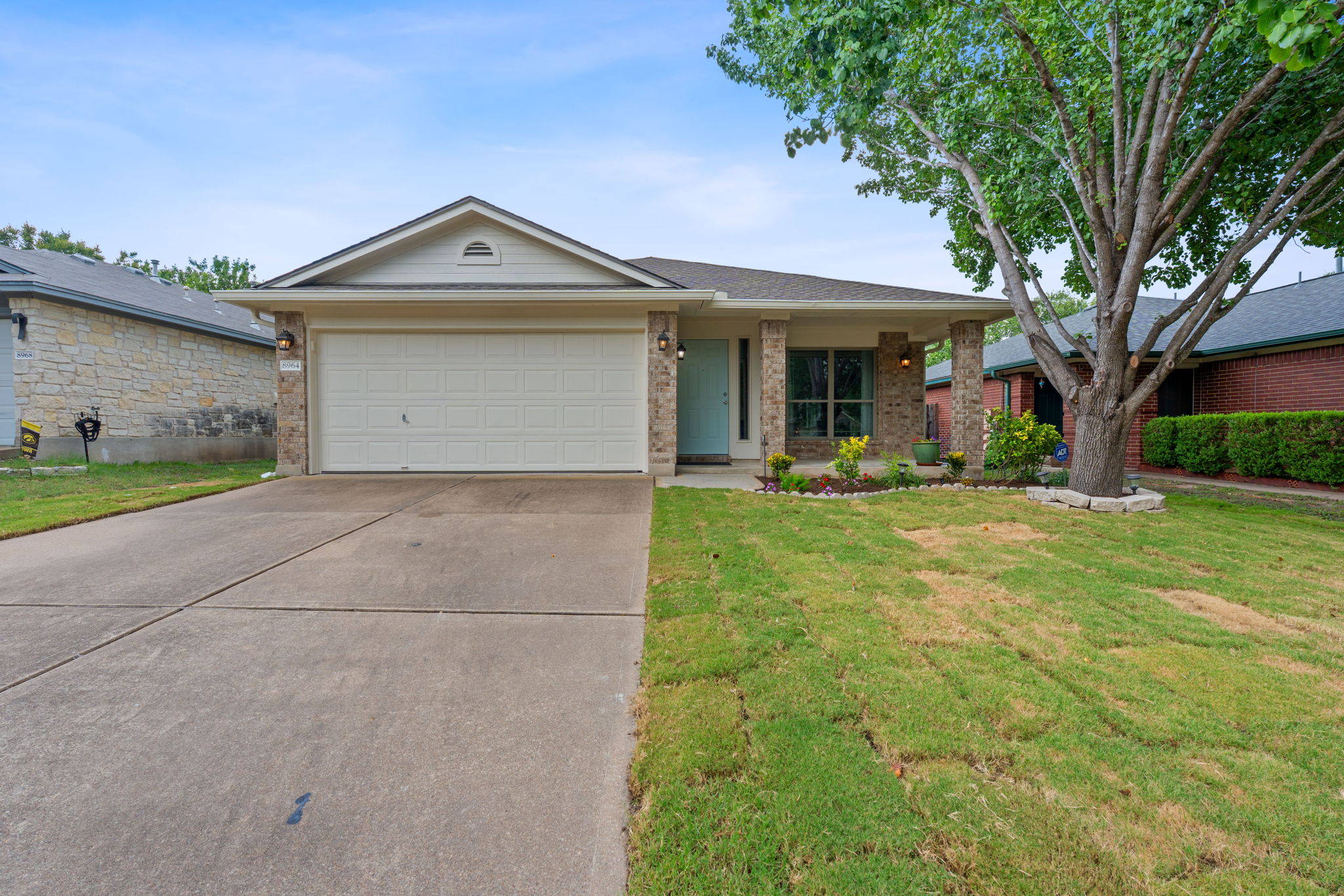 8964 West Hove Loop Austin, TX 78749 - Photo 1 of 1 Freshly laid sod and a mature shade tree welcome you to this single-story brick home with a two-car garage and covered front entry