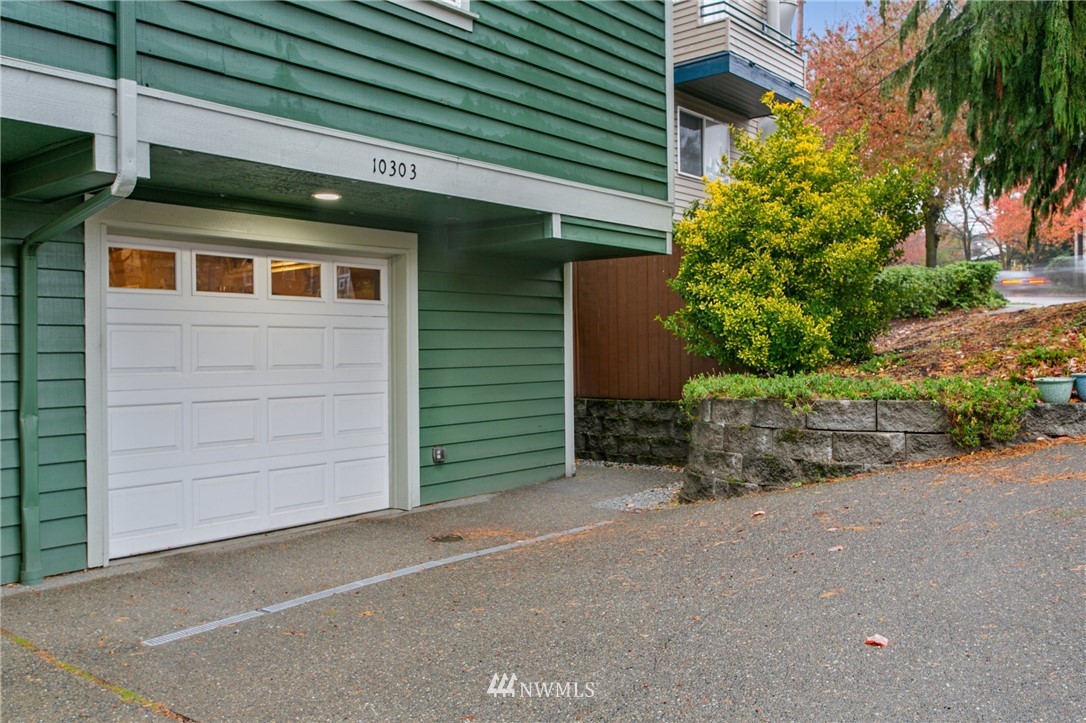 10303 Holman Road North, Unit C Seattle, WA 98177 - Photo 1 of 23 a house view with a outdoor space