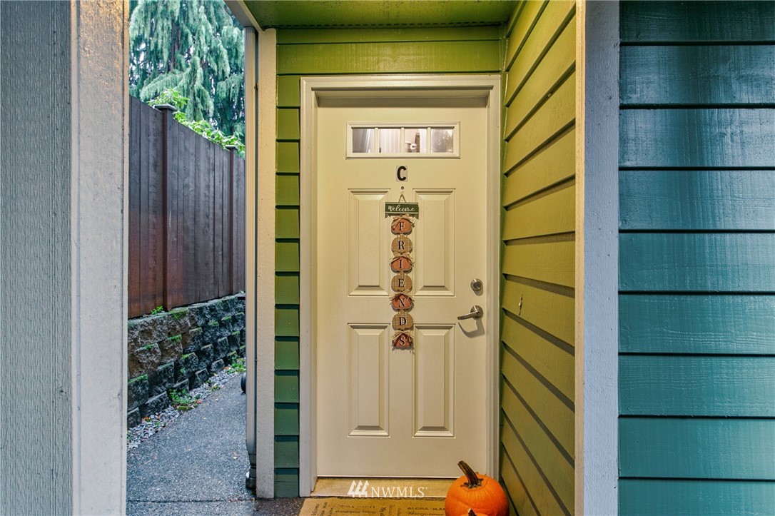 10303 Holman Road North, Unit C Seattle, WA 98177 - Photo 2 of 23 a view of a entryway door of the house