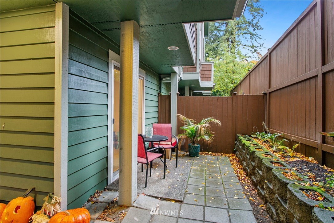 10303 Holman Road North, Unit C Seattle, WA 98177 - Photo 20 of 23 a front view of a house with outdoor seating