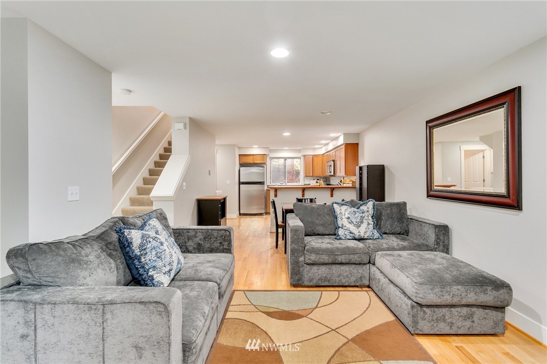 10303 Holman Road North, Unit C Seattle, WA 98177 - Photo 5 of 23 a living room with furniture and a couch