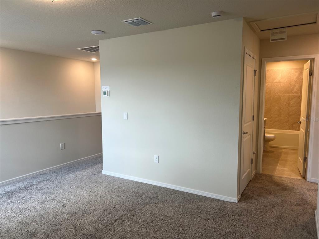 2007 Alluring Lane Davenport, FL 33896 - Photo 13 of 31 a view of an empty room