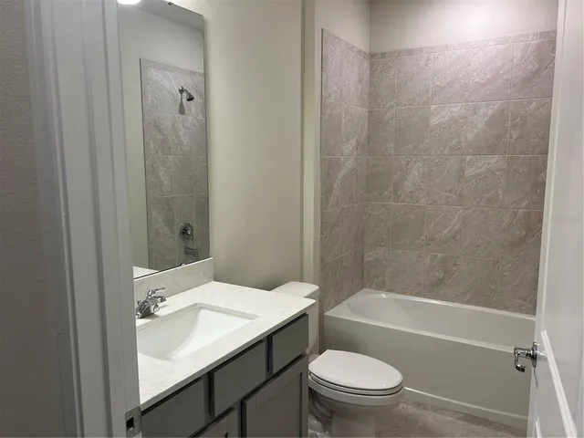 a view of hallway with chandelier