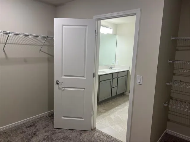 a view of a room with racks on the wall