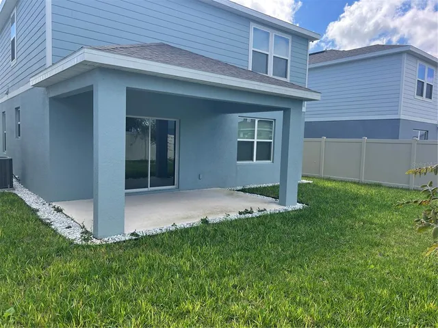 a view of a porch with a yard