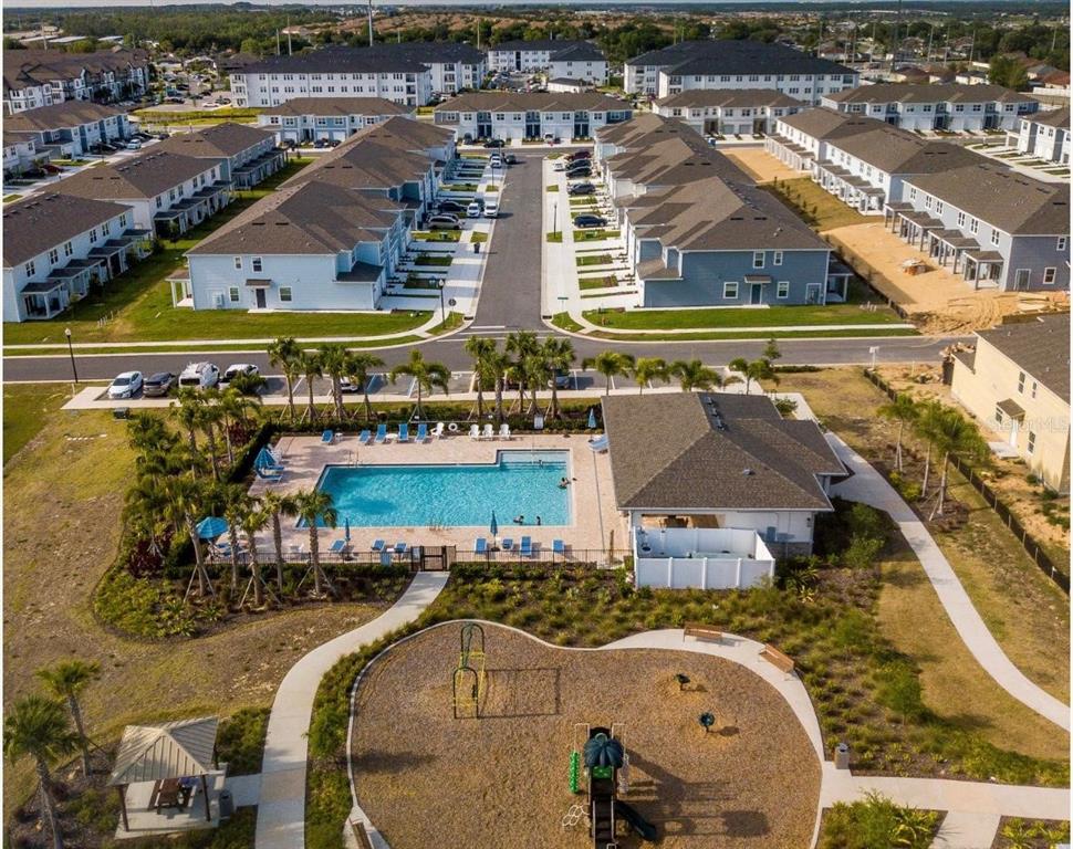 2007 Alluring Lane Davenport, FL 33896 - Photo 31 of 31 an aerial view of a house with outdoor space