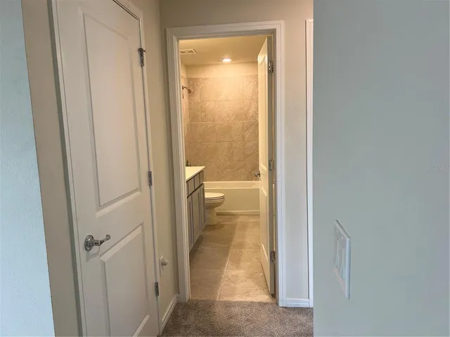 a view of a bathroom from a bathroom