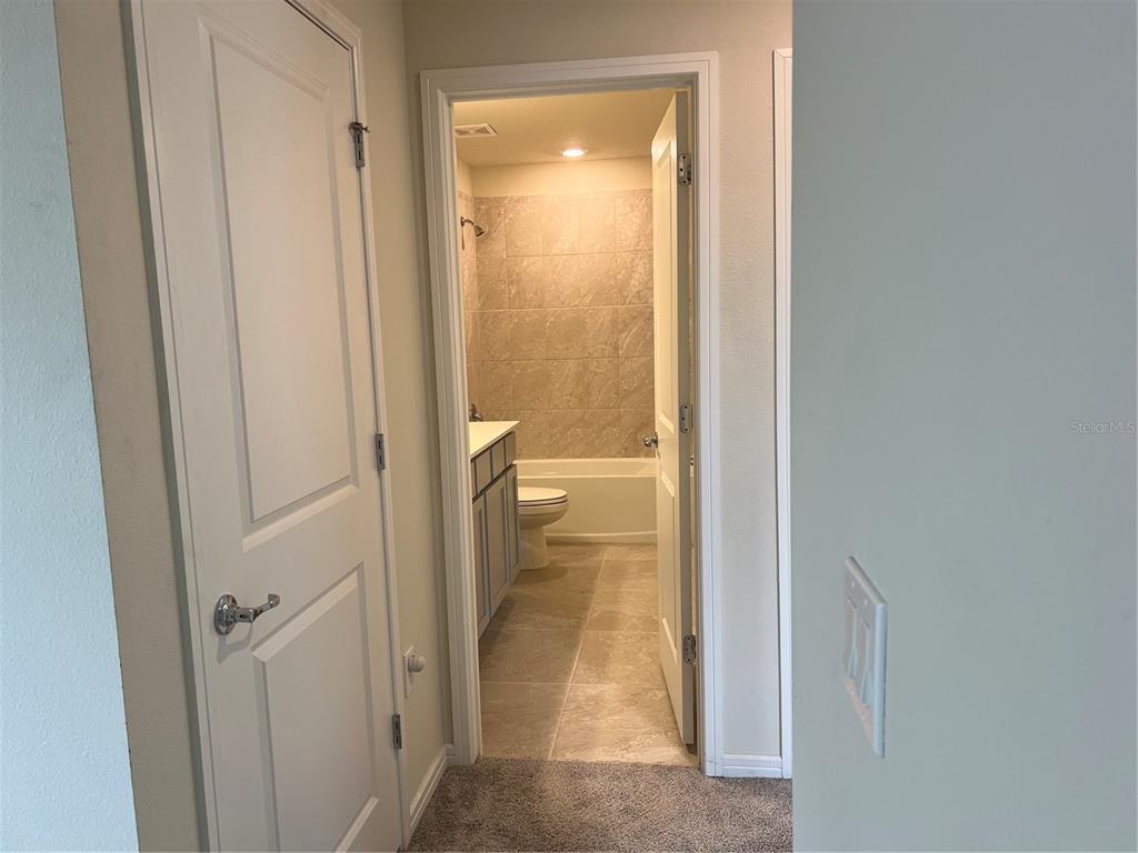 2007 Alluring Lane Davenport, FL 33896 - Photo 9 of 31 a view of a bathroom from a bathroom