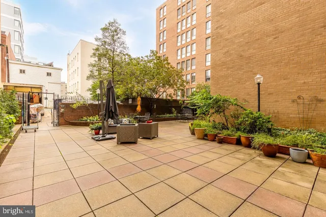 a view of a terrace with sitting area