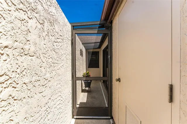a view of house with yard outdoor seating and entertaining space