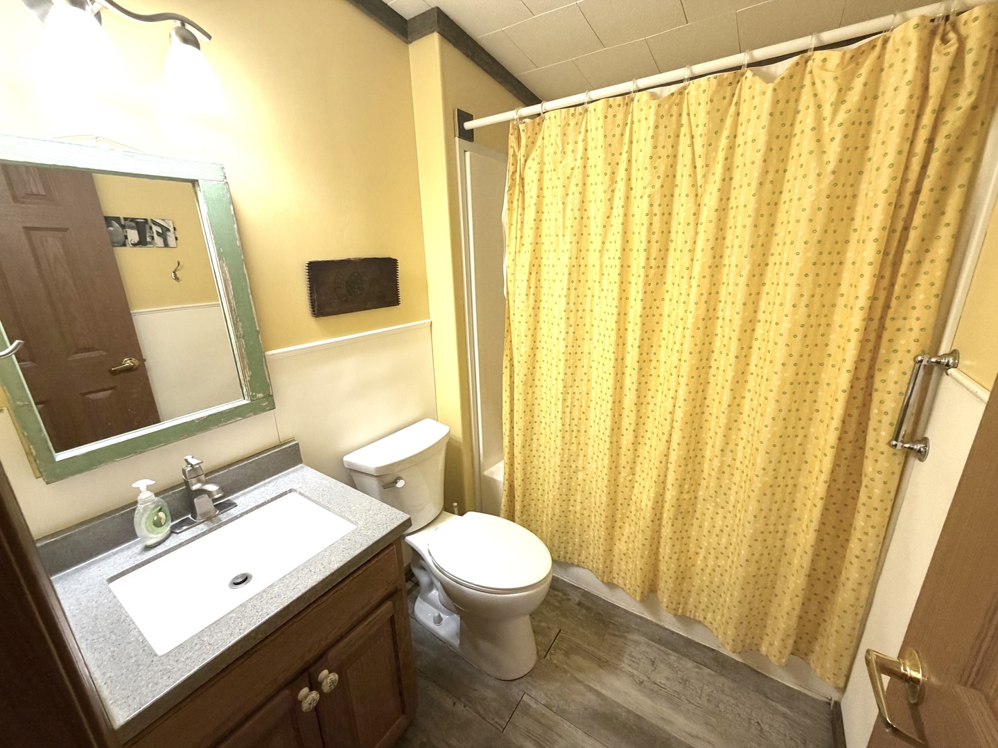 2235 Chesapeake Lane Centralia, IL 62801 - Photo 11 of 22 a bathroom with a sink and a mirror