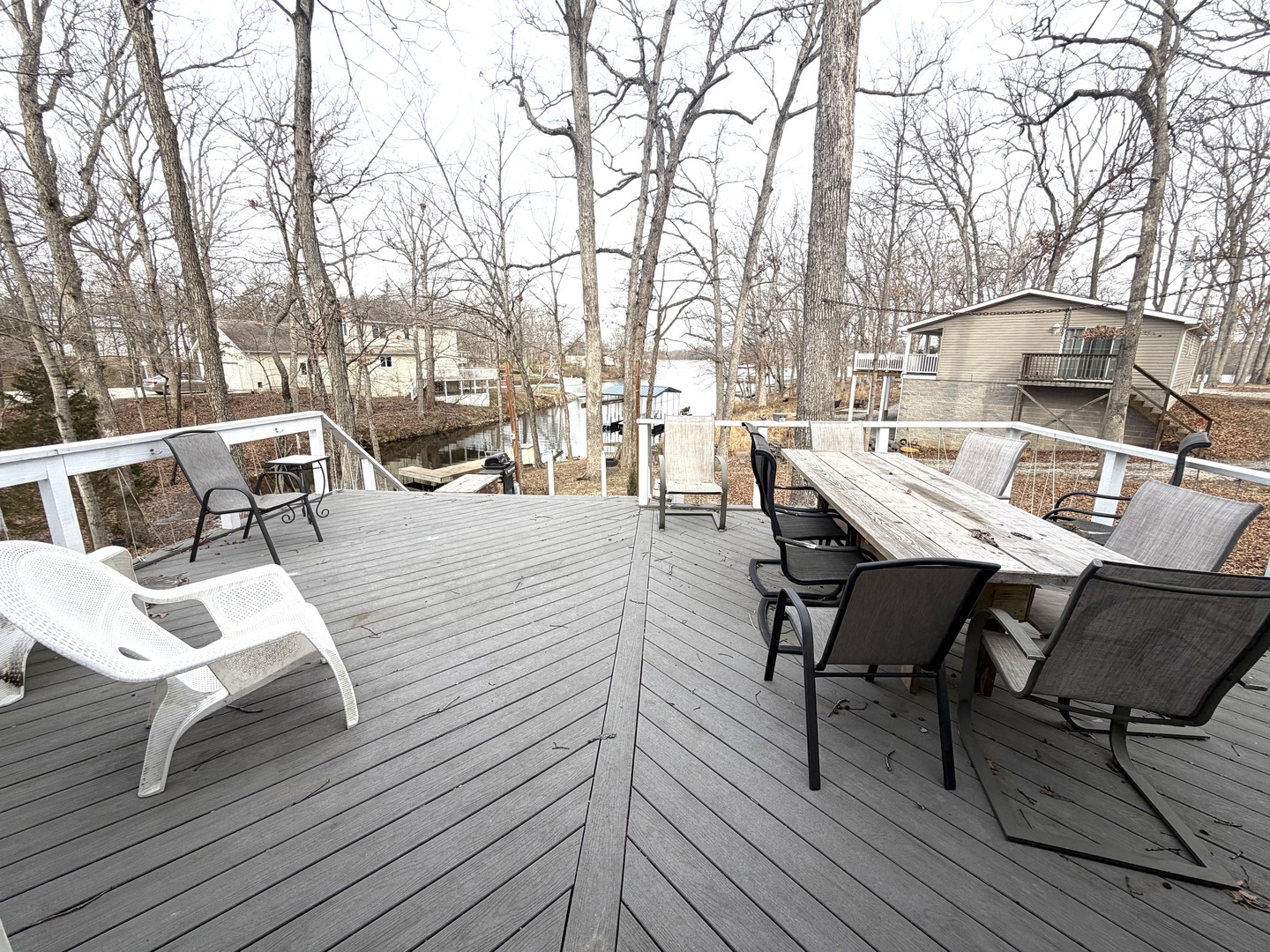 2235 Chesapeake Lane Centralia, IL 62801 - Photo 4 of 22 a view of a patio with table and chairs with wooden floor and fence