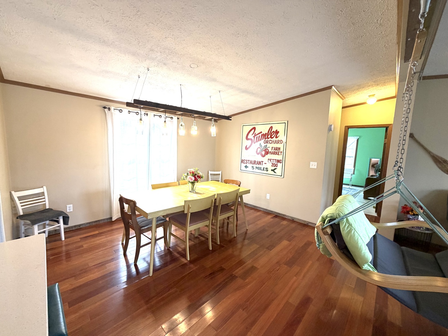 2235 Chesapeake Lane Centralia, IL 62801 - Photo 9 of 22 a view of a dining room with furniture window and wooden floor