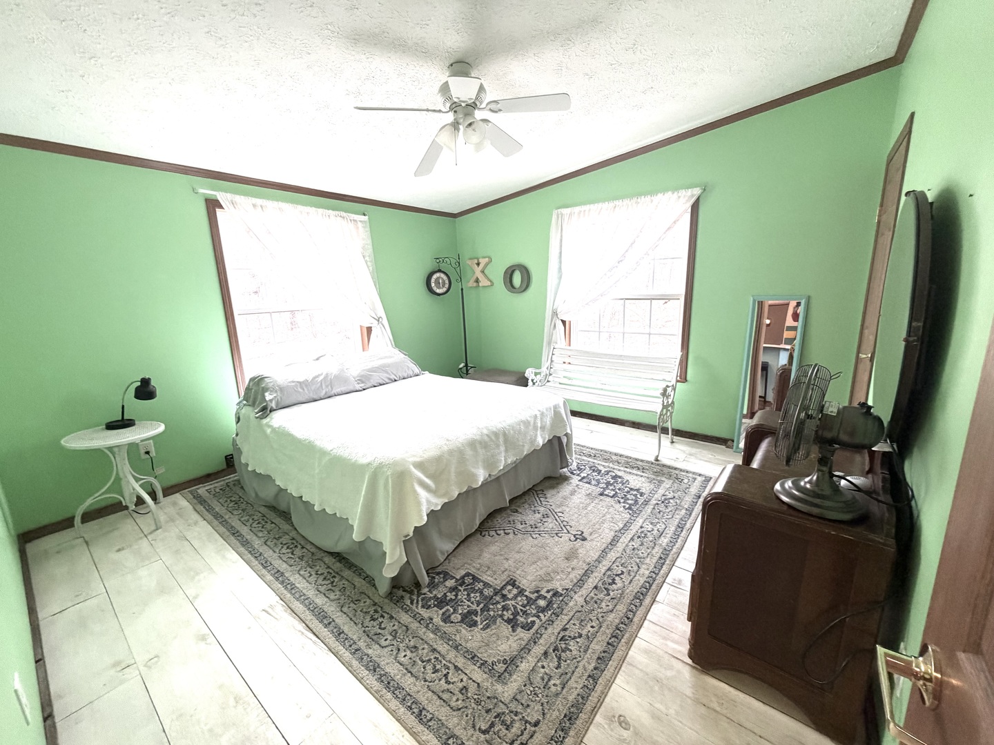 2235 Chesapeake Lane Centralia, IL 62801 - Photo 10 of 22 a bedroom with a bed a mirror on desk and a window