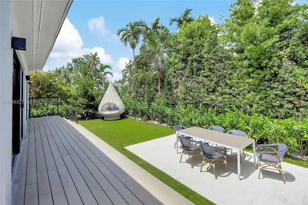 an outdoor space with furniture