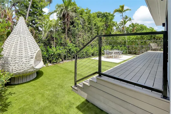 a view of a deck with a large garden